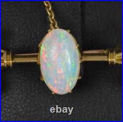 Colourful Victorian 15 Carat Gold and Natural Opal Brooch