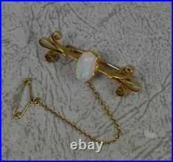 Colourful Victorian 15 Carat Gold and Natural Opal Brooch