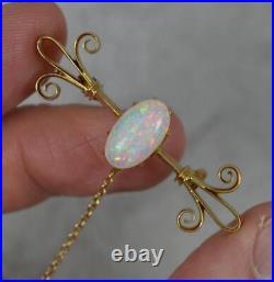 Colourful Victorian 15 Carat Gold and Natural Opal Brooch