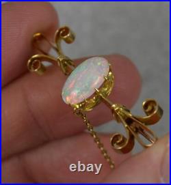 Colourful Victorian 15 Carat Gold and Natural Opal Brooch