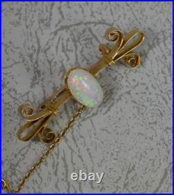 Colourful Victorian 15 Carat Gold and Natural Opal Brooch